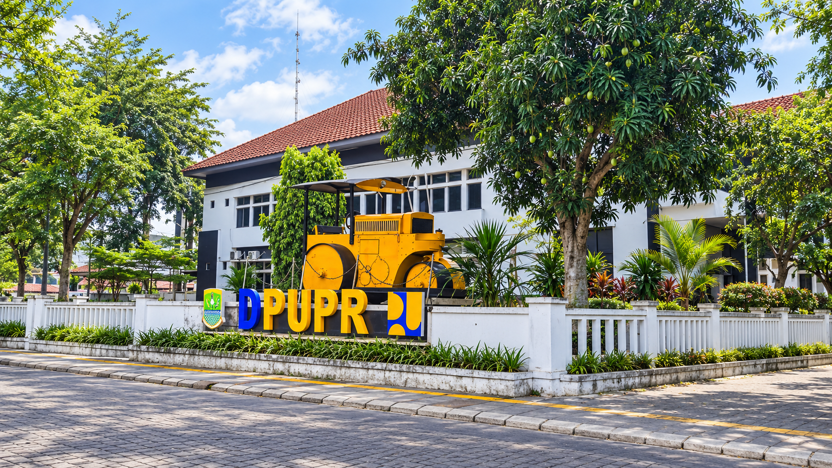 Kantor Dinas PUPR Kabupaten Karawang dan monumen alat berat